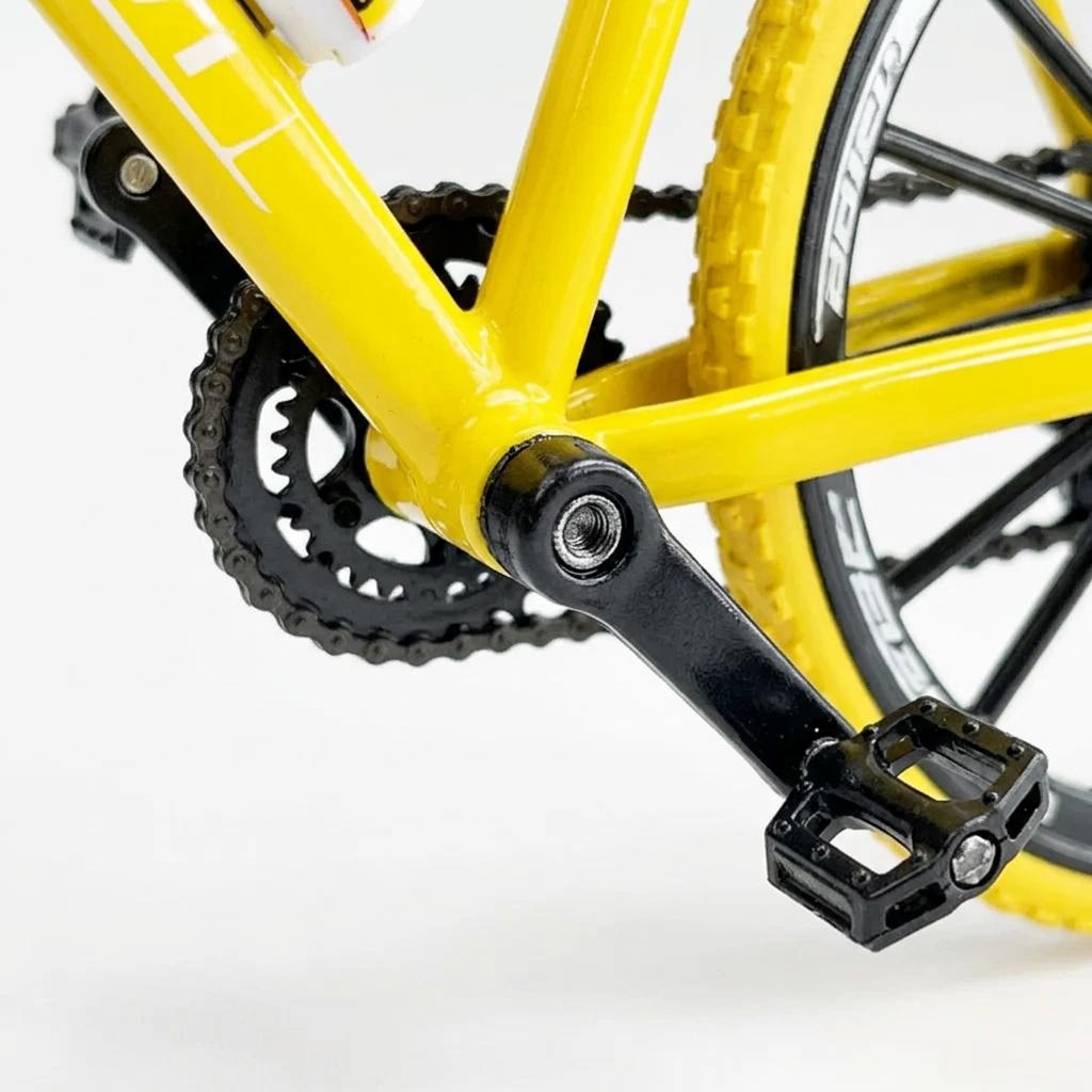 Pedales y biela reales — bici amarilla brillante
