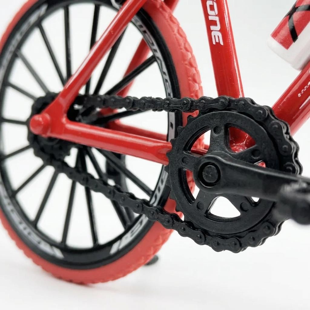 Pinon fijo — catalina y pinon con cadena de goma negra, bici roja